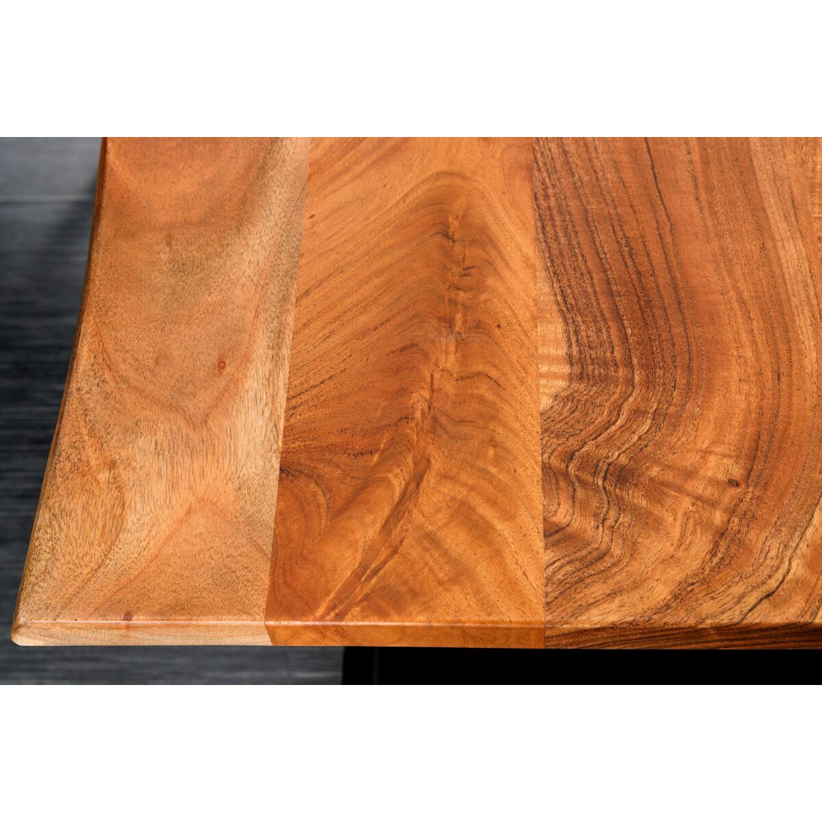 Close-up of a Wooden electric adjstable desk surface with visible grain and texture